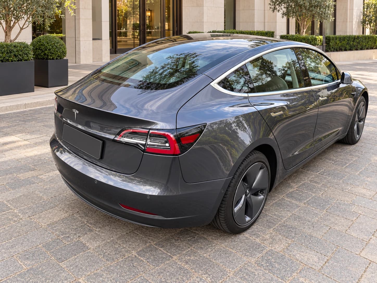 Tesla Model 3, rear three-quarter view from the right