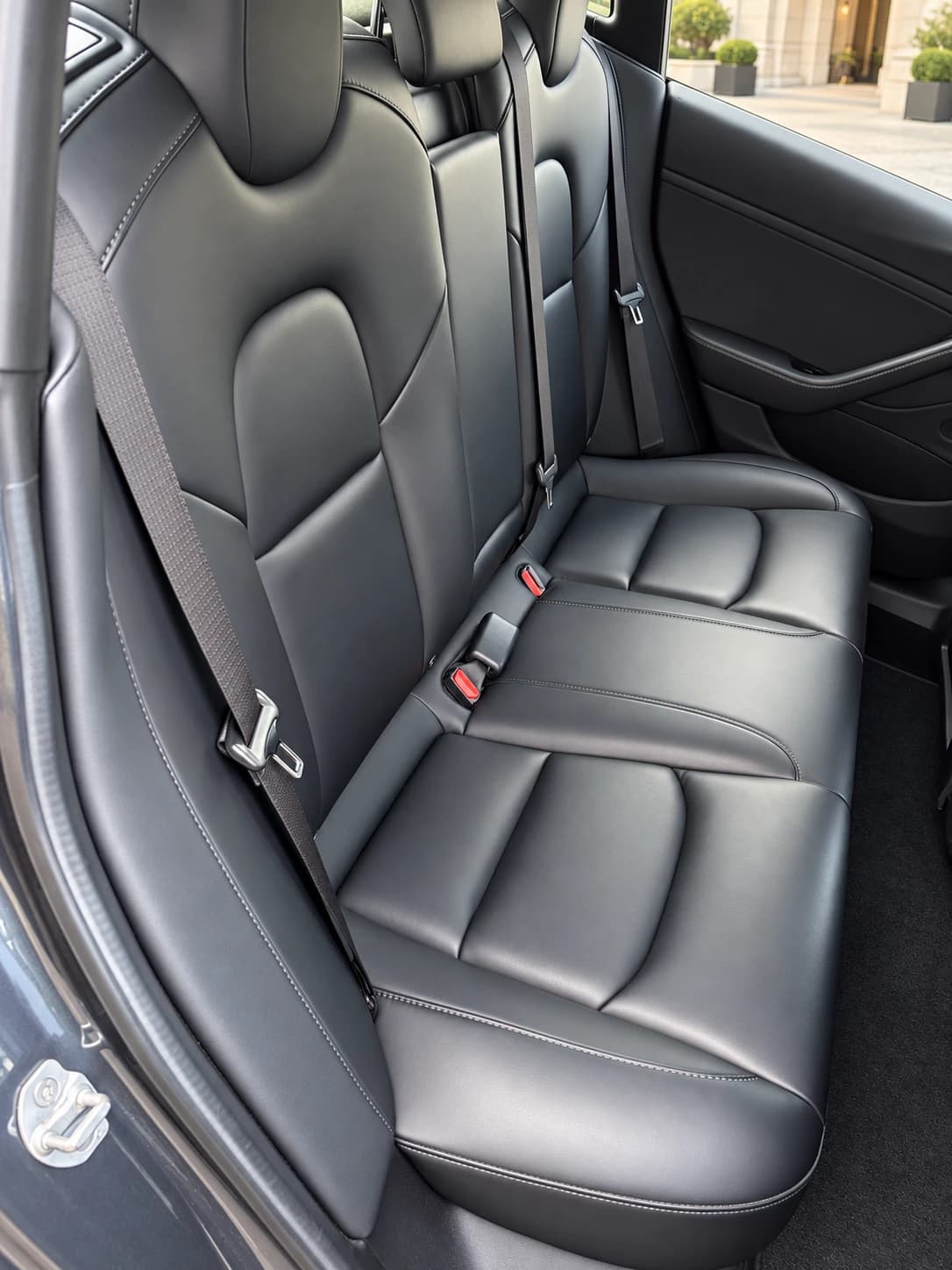 Black rear seat of the Tesla Model 3